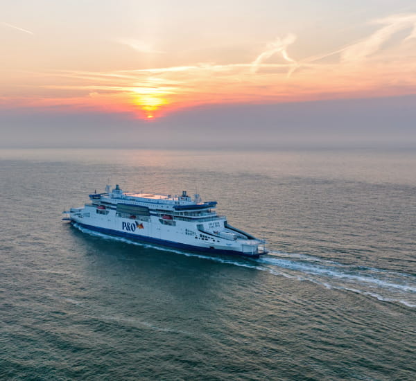 Photo of P&O ship sailing at sunset