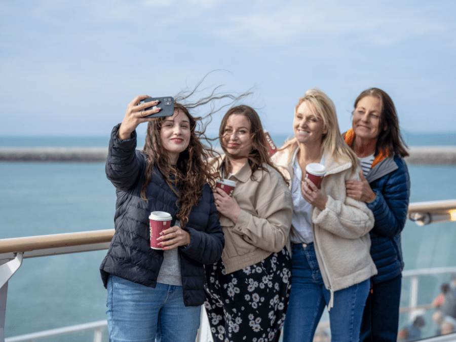 Friends outside taking selfie