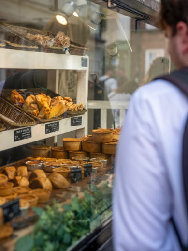 Man looking at food in city of York