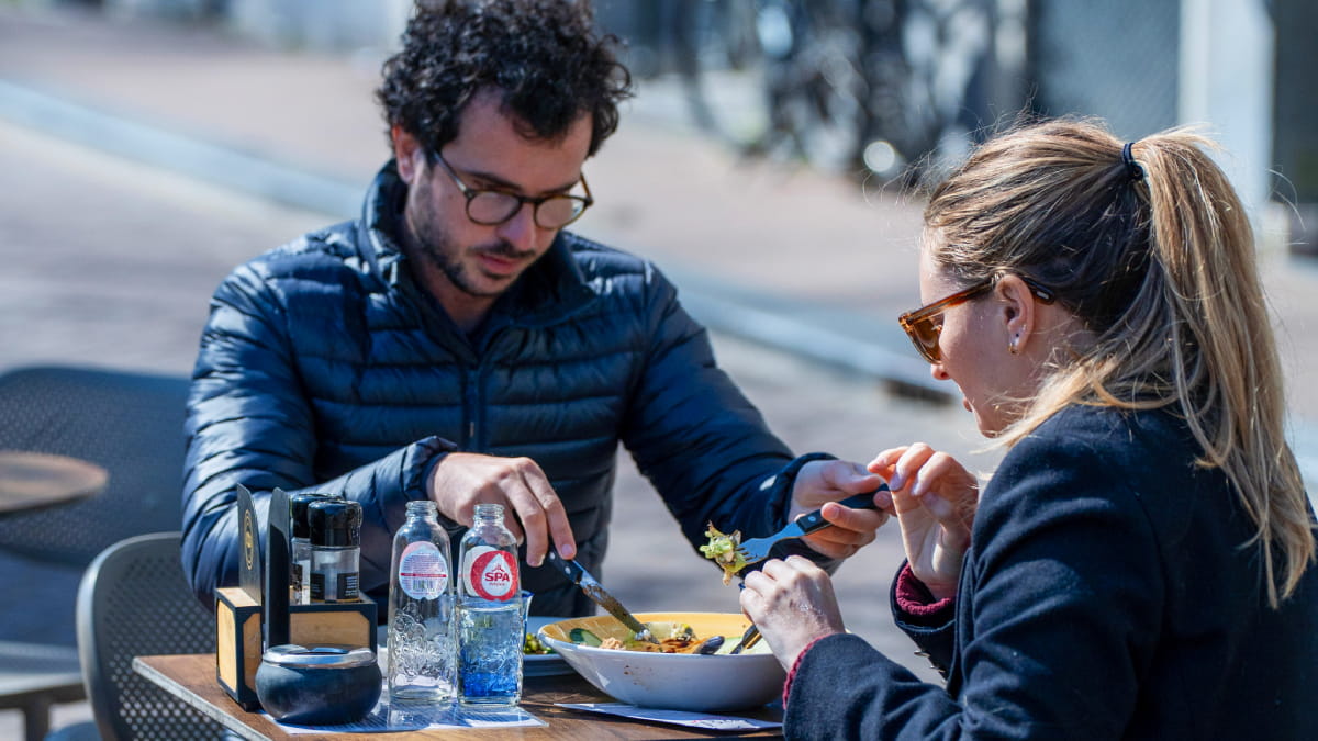 Couple eating in Amsterdam