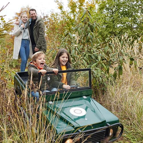 Children playing in miniature jeep at Center Parcs