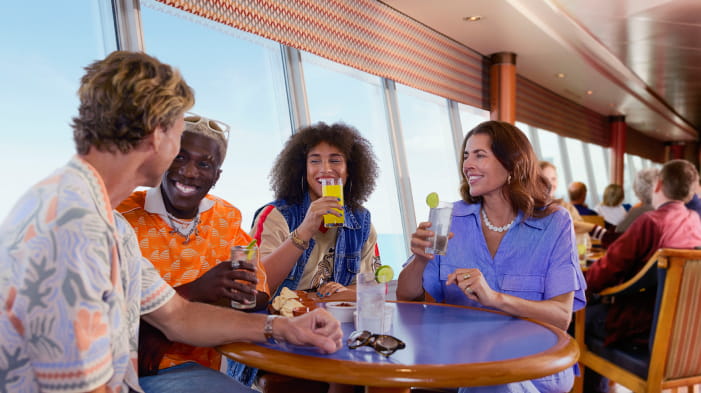 Adults enjoying drinks in P&O Ferries Bar Lounge