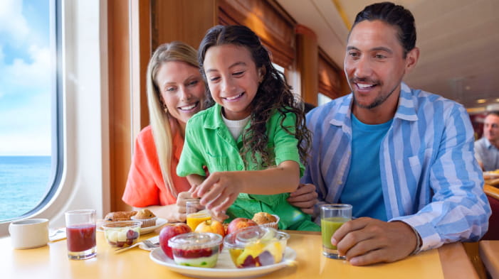 Family enjoying food in The Kitchen