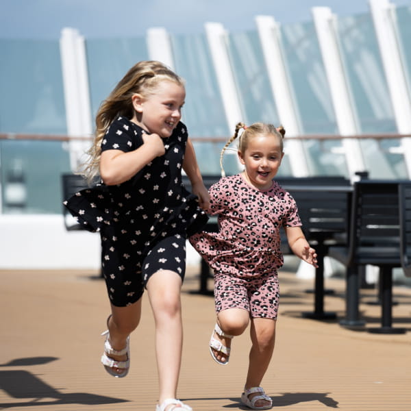 kids running on ferry