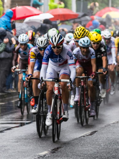 Tour de France peloton in rainy weather