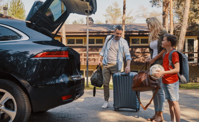 Family packing car for holiday