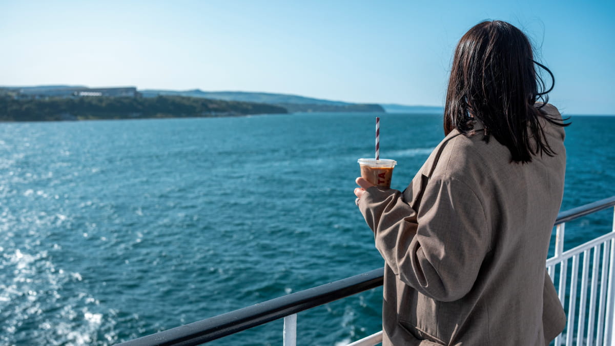 Passenger enjoying deck views on Cairnryan to Larne ferry