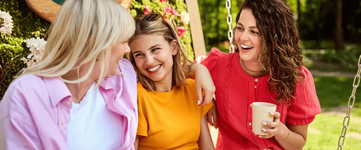 3 women sat talking at center parcs