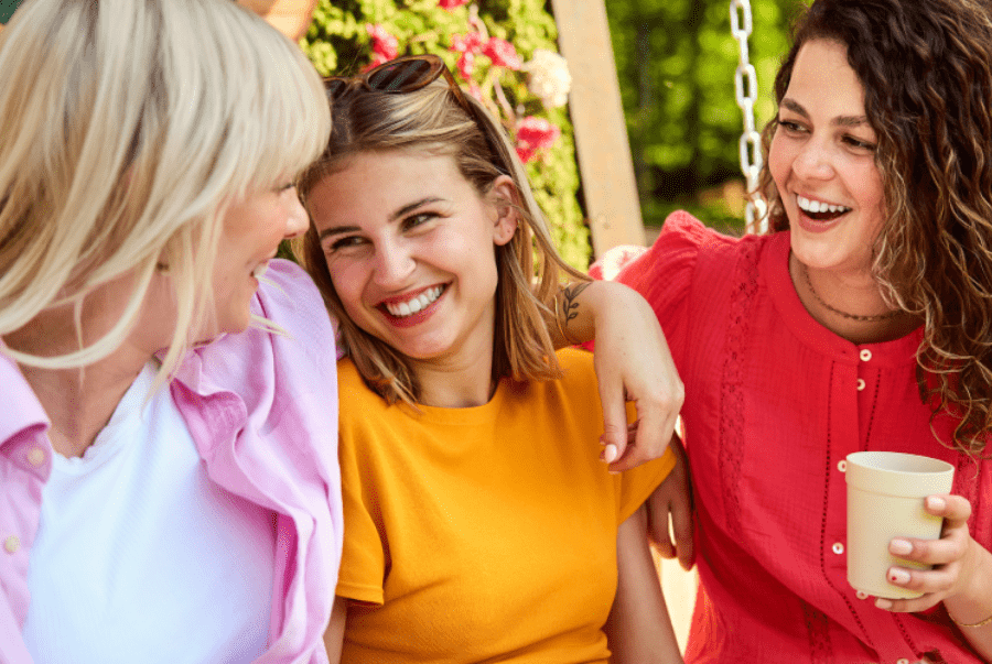 3 women sat talking at center parcs
