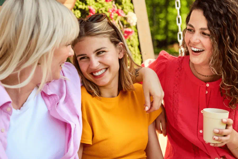 3 women sat talking at center parcs