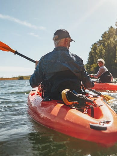 Mature couple on a kayaking holiday